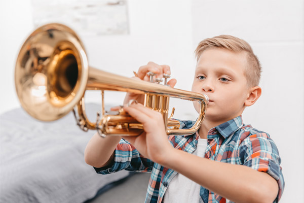 boy-playing-trumpet